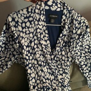 Women’s blue and white print dress. Knee length, tie waist